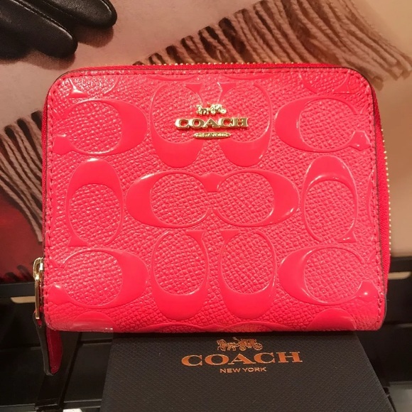 Coach Handbags - Authentic emboss. patent leather zip around wallet